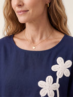 Linen-Lyocell Floral Cord Embroidered Asymmetric Hem Top FLORENE